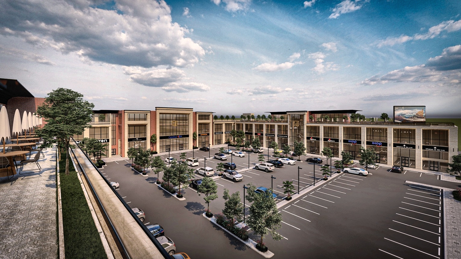 Aerial view of the retail complex and parking